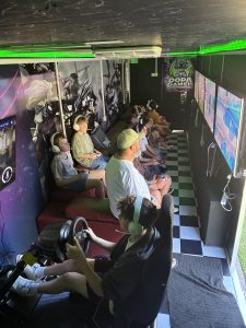 Inside the Dopa Gamer mobile gaming theatre with PS5 and racing simulators